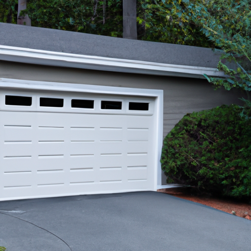 Suburban Wayland garage door with visible insulated panels and new weatherstripping, no people.
